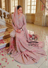 Embrace a rich history with our traditional jamawar Farshi Lehenga which is paired with luxuriant silk chiffon A-line long shirt and Dupatta.