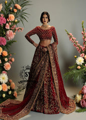 This Deep Maroon bridal dress, with carefully crafted Lehenga Choli details and impeccable finishes, will make every bride feel like a divine princess on her big day.