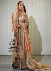 Charming A-line wedding dress with long Fully embellished sleeves and a boat neckline, with a voluminous princess-style lehenga skirt with a spectacular train.