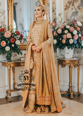 An embellished bridal dress with royal silhouette farshi Lehenga, embodying the perfect blend of classic sophistication and ethereal romance. The Crystal embroidery asserts itself, scattered in places, dense in others, evoking radiant brilliance throughout.