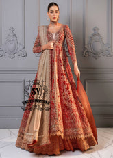 A masterpiece of an embellished long gown, featuring a jamawar bustier, a daring front slit and tulle sleeves with elongated beaded cuffs. Perfect for the red carpet, this Lehenga bridal dress brings Bollywood glamour all the way down the aisle.