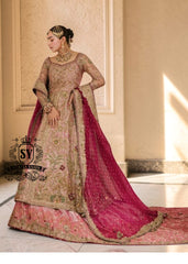 Unleash your inner star with our exquisite haute couture wedding dress, where modern elegance meets sophisticated warmth! This stunning Pishwas is designed to make you feel like royalty, with its delicate hand-embroidered technique and dramatic farshi Lehenga.