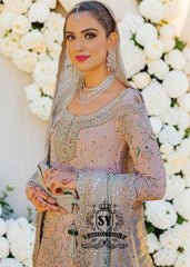 You can conquer the world! Exclusive Bridal dress style with perfect Lehenga lines. Underline your status with Fair Pink Wedding dress.