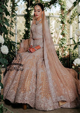 Mermaid wedding dress by Shazia Yasin. Elegant Lehenga design, high-quality fabrics, and a perfect fit for your special day. The unique design of a mermaid wedding dress always makes an impression, and with our Lehenga Choli designs, you'll win the hearts of your guests. See for yourself!