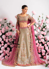 This Bridal dress is the true embodiment of elegance: delicate, silky Lame envelops the Lehenga silhouette, emphasizing every movement. Rich decoration creates a radiant effect - exquisite embroidery with pearls, beads and crystals adds depth and noble shine.
