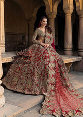 This Angels Red bridal dress is the epitome of grace and grandeur — a wedding lehenga choli dress crafted to perfection for your big day. Full of shine and feminine charm, this is a perfect choice for brides who want to subtly shine on their big day.
