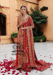 Radiating pure Amaranth Red bridal dress magic with two legged farshi lehenga. A perfect balance of grandeur and simplicity.