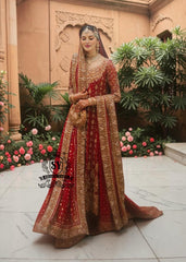 Radiating pure Amaranth Red bridal dress magic with two legged farshi lehenga. A perfect balance of grandeur and simplicity.
