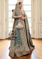 A royal look for a Full-figured bride will be created by this A-line long shirt with farshi lehenga dress made of luxurious lame fabric in Tradewind color.