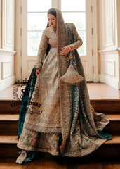 A royal look for a Full-figured bride will be created by this A-line long shirt with farshi lehenga dress made of luxurious lame fabric in Tradewind color.
