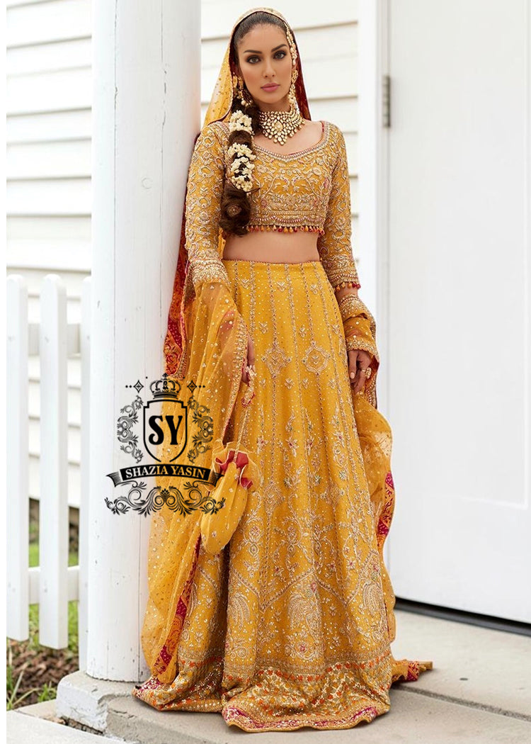 Envelop yourself in the magic of this Fluorescent Orange bridal dress is a perfect example of elegance and craftsmanship, designed for the bride who desires an unforgettable Mayon look.
