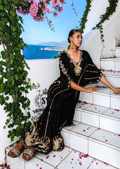 Be dazzling with this elegant black velvet Kaftan dress. Designed with both classic and modern lines, black velvet Kaftan dresses add a sophisticated touch to your wardrobe. Experience the elegance of this unique Embellished Kaftan at Shazia Yasin.