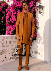 Latest arrival - feast your eyes on this stunning creation Prince Coat featuring vibrant thread embroidery and ethereal soft silk kurta Pajama.