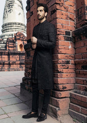 Discover the magic of black in our new sherwani suit—the perfect blend of understated elegance and touch of sophistication. Black doesn't just slim and add luxury: it creates an aura of mystery that draws eyes and sets hearts racing.