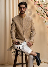 The signature elegance of the modern groom. A Sherwani suit that combines style, tradition, and premium tailoring. This elegant Bright Wood Sherwani dress blends timeless elegance with exquisite artistry, featuring beautiful embroidery that speaks of tradition and modern luxury.