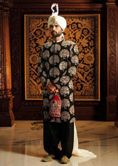 We love the striking contrast of the hand embellished sherwani and premium raw silk, which adds a touch of sophistication. The perfectly tailored cut create a spectacular silhouette for the groom seeking radiant and memorable elegance. An ultra-elegant and graceful look, perfect for a truly gentle wedding day.