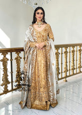 Our radiant Bride shining in the elegant angrakha pishwan, crafted from luxurious silky lame and adorned with exquisite embellishments. Let this gold outfit accentuate your captivating beauty!