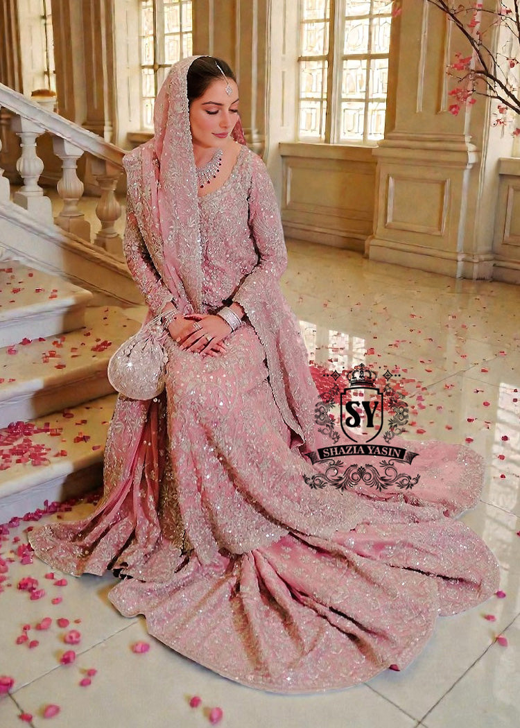 Embrace a rich history with our traditional jamawar Farshi Lehenga which is paired with luxuriant silk chiffon A-line long shirt and Dupatta.