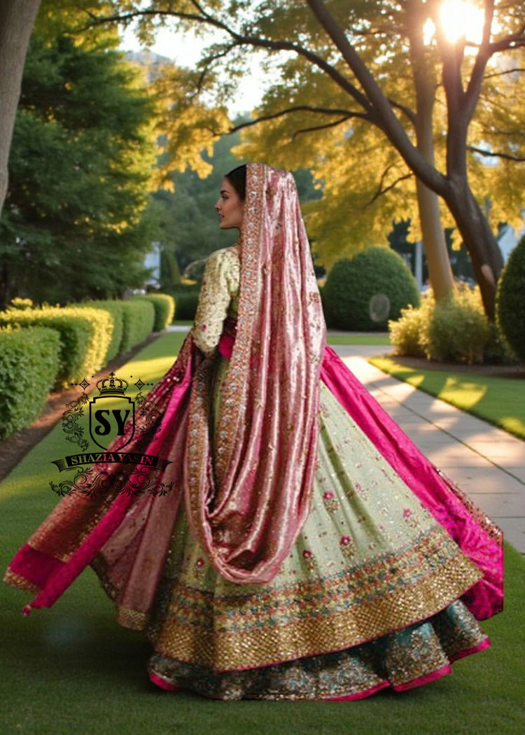 Introducing Bridal Pishwas with lehenga by Shazia Yasin - where royal meets romance, this intricate embellished wedding dress whispers a tale of sophistication.