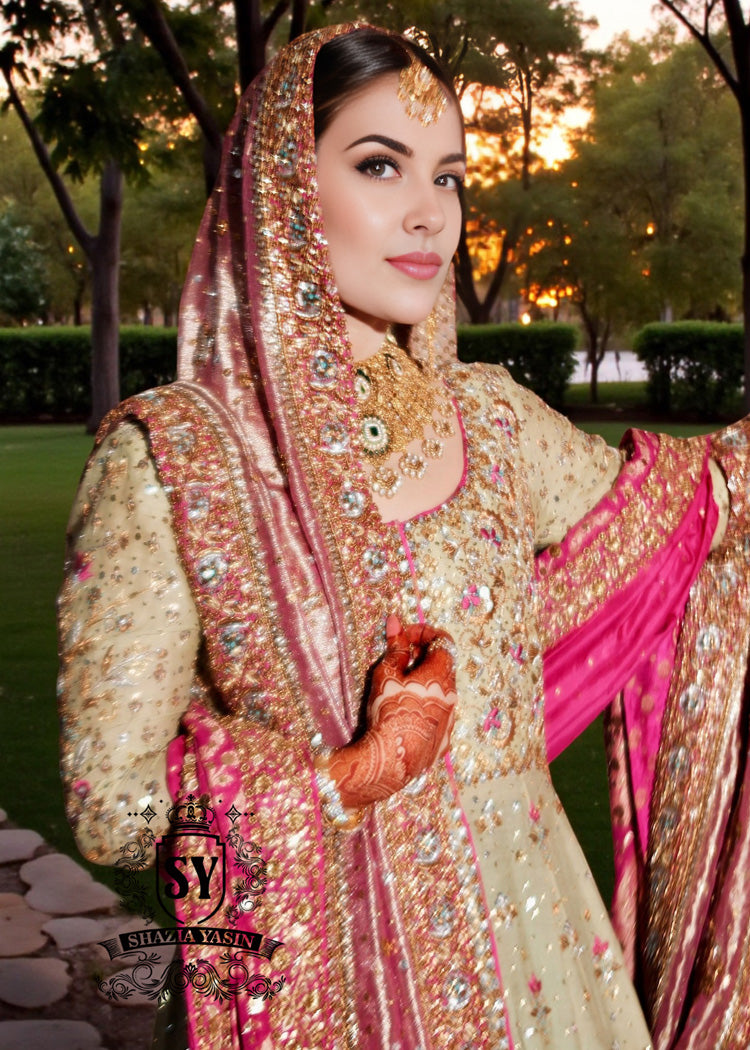 Introducing Bridal Pishwas with lehenga by Shazia Yasin - where royal meets romance, this intricate embellished wedding dress whispers a tale of sophistication.
