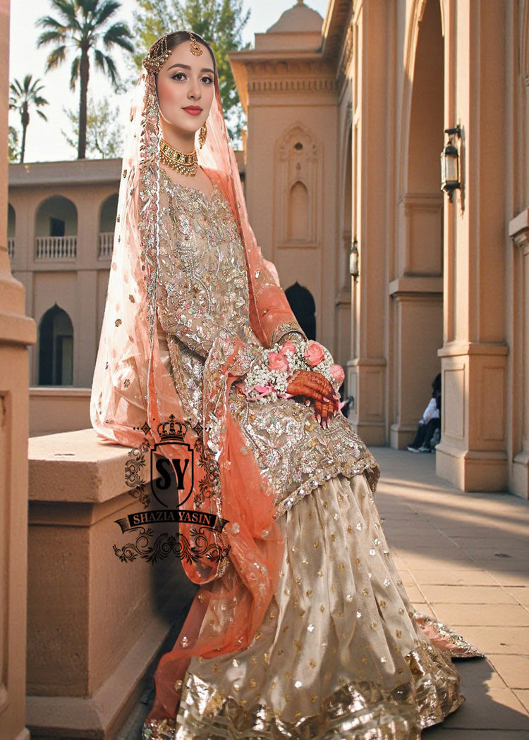 Stepping into forever in this Gharara from the 2026 Bridal Collection. A Divine Gharara dress with delicate Gota lace and a touch of heavenly elegance, perfect for a classic Nikkah ceremony.