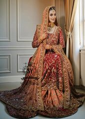 Barn Red red lehenga for a Pakistani wedding ceremony is a Mughal-inspired Bridal dress adorned with lightest hand embroidery and exquisite embellishments that will make you look stunning at your wedding. Fast Shipping available.
