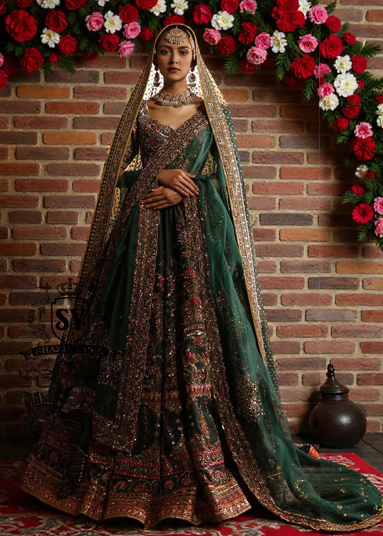 Get the look in this stunning Emerald Luxe Bridal Lehenga Choli with a touch of ruby — the perfect blend of elegance and timeless glamour for your special day.
Let us help you create unforgettable memories with a look that truly shines.
