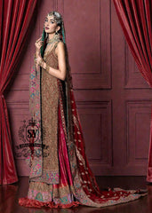 Immerse yourself in the timeless brilliance of a Pakistani couture bridal lehenga. Vibrant traditional hues of red are lightly interwoven with shimmering gold, enveloping the bride in an aura of glamour and grace.