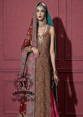 Immerse yourself in the timeless brilliance of a Pakistani couture bridal lehenga. Vibrant traditional hues of red are lightly interwoven with shimmering gold, enveloping the bride in an aura of glamour and grace.
