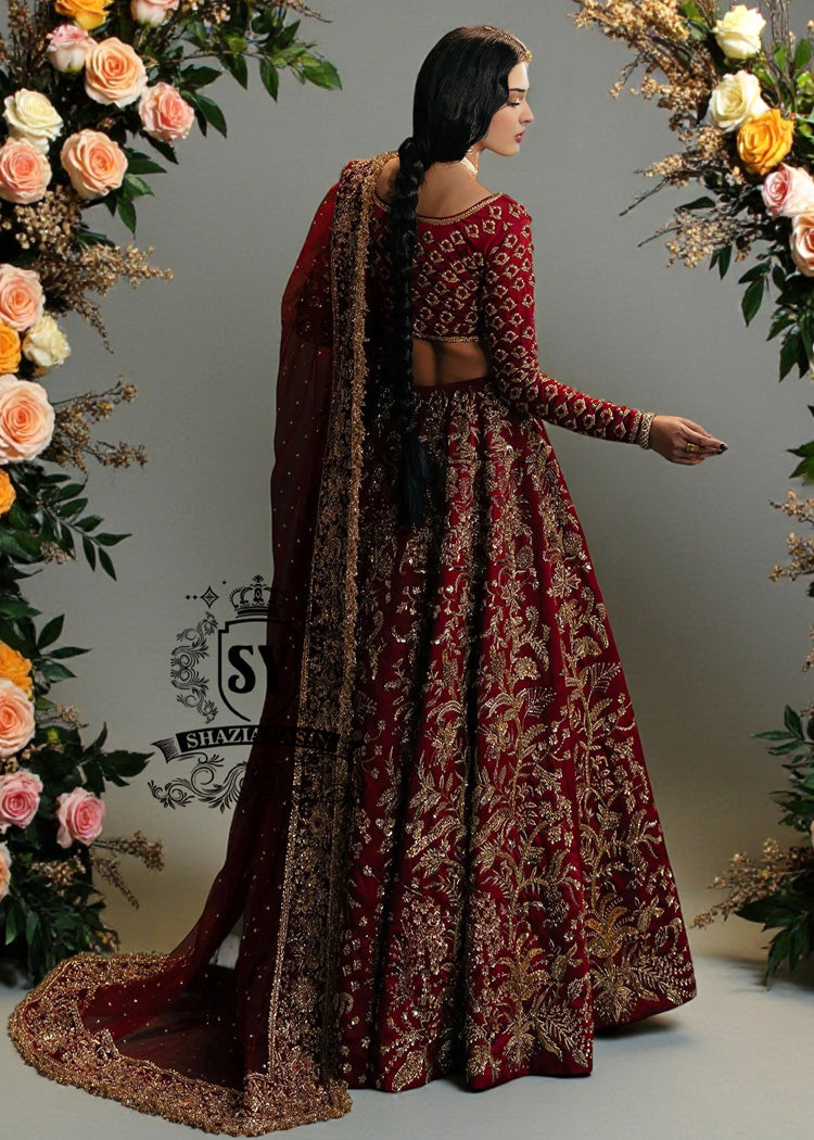 This Deep Maroon bridal dress, with carefully crafted Lehenga Choli details and impeccable finishes, will make every bride feel like a divine princess on her big day.