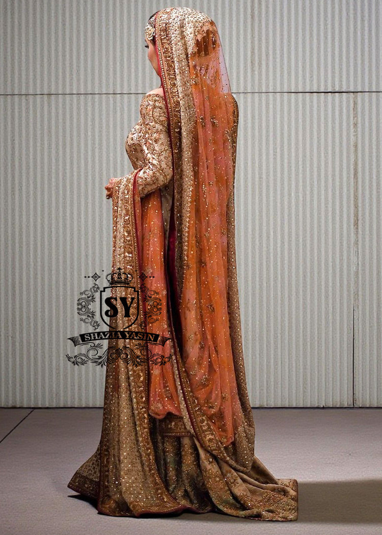 Charming A-line wedding dress with long Fully embellished sleeves and a boat neckline, with a voluminous princess-style lehenga skirt with a spectacular train.