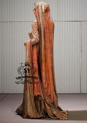 Charming A-line wedding dress with long Fully embellished sleeves and a boat neckline, with a voluminous princess-style lehenga skirt with a spectacular train.