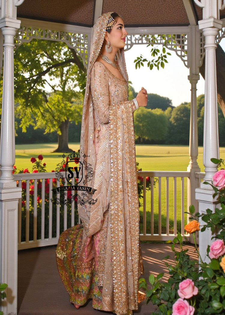 This incredibly romantic bridal dress will make any bride feel like a fairy tale heroine on her wedding day. Striking contrast with the voluminous farshi lehenga skirt.