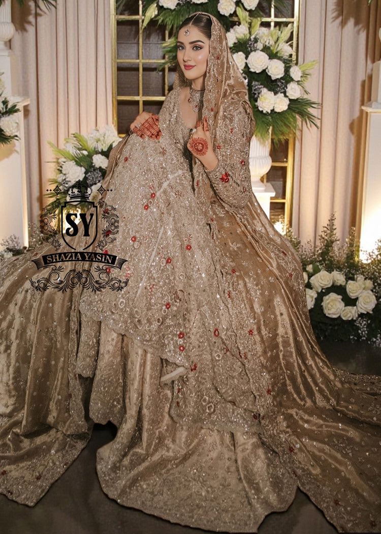 A Pishwas Dress that shimmers like a quiet celebration, made to illuminate your walk down the aisle and wrap every step in a soft, radiant glow. Luxury Lehenga Crafted with meticulous detail, it turns the calm magic of winter into a moment of pure brilliance.
