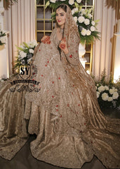 A Pishwas Dress that shimmers like a quiet celebration, made to illuminate your walk down the aisle and wrap every step in a soft, radiant glow. Luxury Lehenga Crafted with meticulous detail, it turns the calm magic of winter into a moment of pure brilliance.