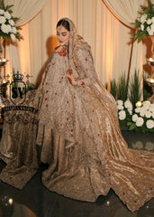 A Pishwas Dress that shimmers like a quiet celebration, made to illuminate your walk down the aisle and wrap every step in a soft, radiant glow. Luxury Lehenga Crafted with meticulous detail, it turns the calm magic of winter into a moment of pure brilliance.