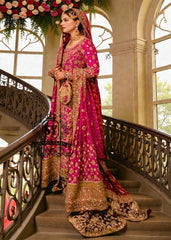A timeless bridal dress design that exudes classic elegance and meticulous craftsmanship. The intricately crafted, opulent Banarsi Jamawar lehenga exudes a royal flair, with its heavy maroon and red borders creating a magnificent, flowing train.