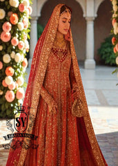 A traditional Pakistani bride epitomizes royal elegance in our newest bridal Pishwas Lehenga dress.