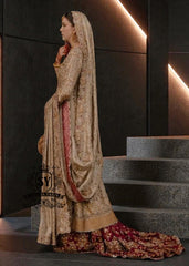 A vision of divine luminosity, this pishwas glimmers like starlight with every movement. Her Lehenga features intricate gold embroidery, delicate florals and crystal embellishments, while her lame dupatta envelops her like a dream.