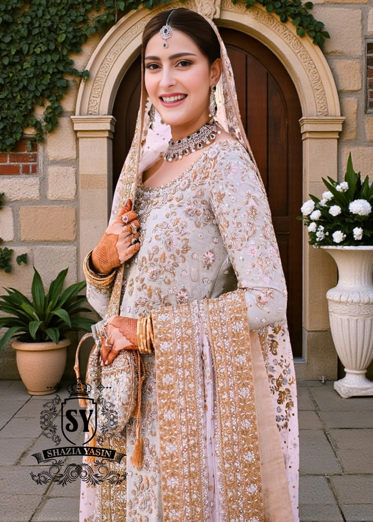 A Bridal dress woven from your dreams: incredibly magnificent, so that you feel like the heroine of your own fairy tale. A Two legged Lehenga silhouette, delicate embellishments, and a whisper of drama.