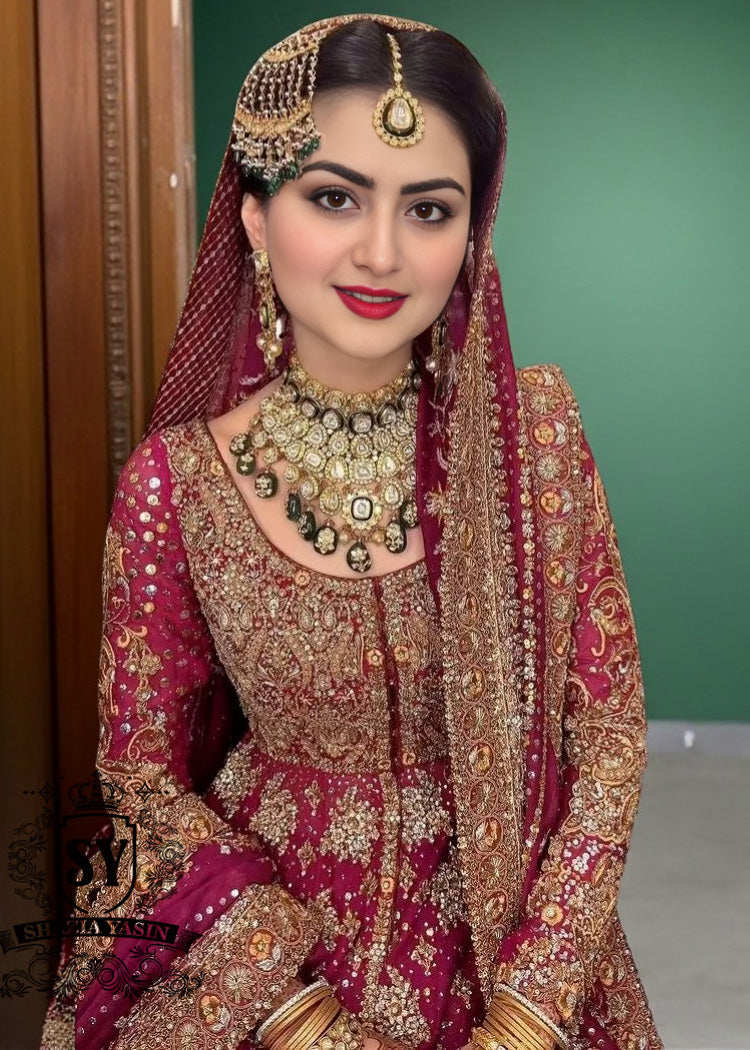 An elegant long Pishwas hand embellished wedding dress designed for the modern bride who wants to truly feel luxury on her wedding day. This dress is ideal for brides searching for a modern wedding dress, farshi bridal lehenga, or a lehenga wedding dress with train.