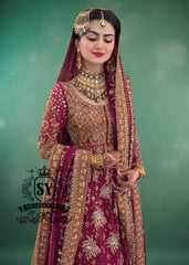 An elegant long Pishwas hand embellished wedding dress designed for the modern bride who wants to truly feel luxury on her wedding day. This dress is ideal for brides searching for a modern wedding dress, farshi bridal lehenga, or a lehenga wedding dress with train.