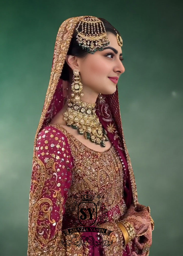 An elegant long Pishwas hand embellished wedding dress designed for the modern bride who wants to truly feel luxury on her wedding day. This dress is ideal for brides searching for a modern wedding dress, farshi bridal lehenga, or a lehenga wedding dress with train.