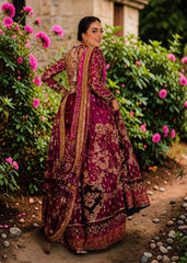 This striking two-tone Berry and Berry Burgundy lehenga choli is heavily embellished with shimmering gold handwork and harmonious silk threadwork for a modern classic look. The luxurious bodice is hand-embellished with diamante detailing, making you stand out in the crowd.