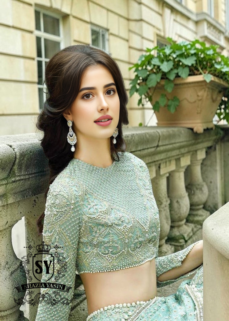 Experience the epitome of haute couture bridal fashion with Shazia Yasin's iconic Lehenga choli dresses, where soft Chiffon meets stunning silhouettes and unparalleled craftsmanship.