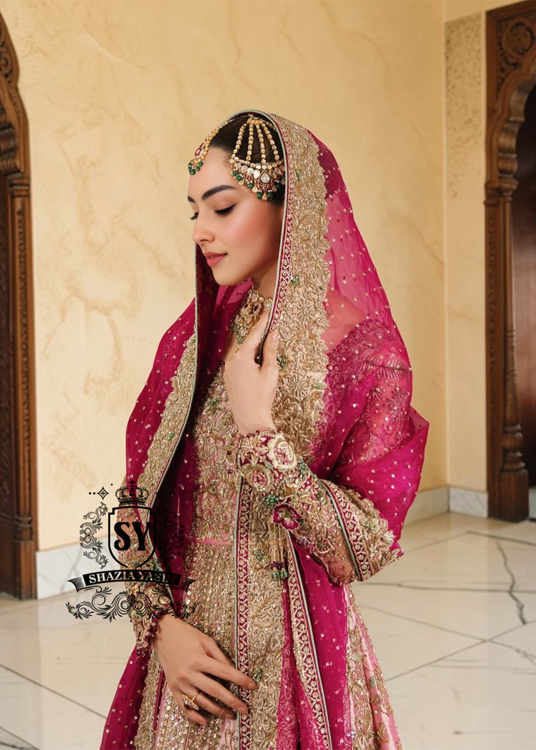 Unleash your inner star with our exquisite haute couture wedding dress, where modern elegance meets sophisticated warmth! This stunning Pishwas is designed to make you feel like royalty, with its delicate hand-embroidered technique and dramatic farshi Lehenga.
