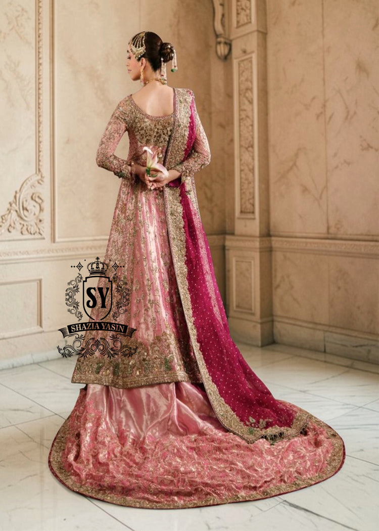 Unleash your inner star with our exquisite haute couture wedding dress, where modern elegance meets sophisticated warmth! This stunning Pishwas is designed to make you feel like royalty, with its delicate hand-embroidered technique and dramatic farshi Lehenga.