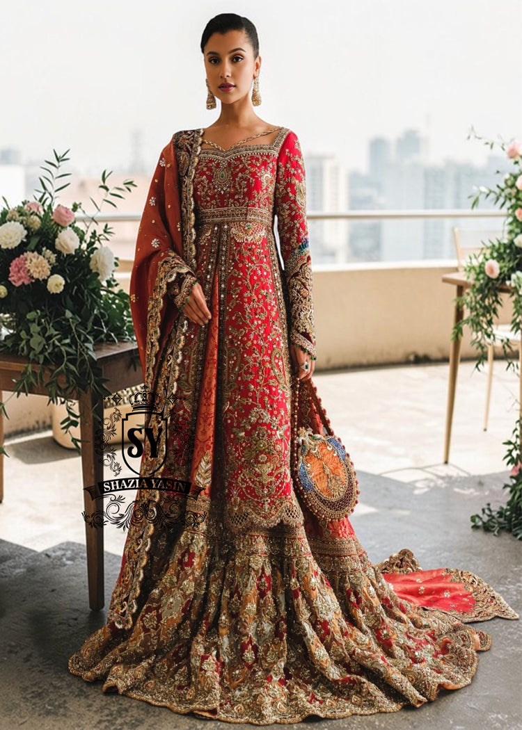 This exquisite red wedding dress exudes elegance and refinement, creating a sophisticated look perfect for a wedding. Chattapati Lehenga's designs are updated to reflect the latest trends, highlighting the bride's femininity.