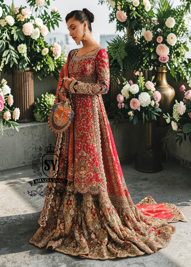 This exquisite red wedding dress exudes elegance and refinement, creating a sophisticated look perfect for a wedding. Chattapati Lehenga's designs are updated to reflect the latest trends, highlighting the bride's femininity.