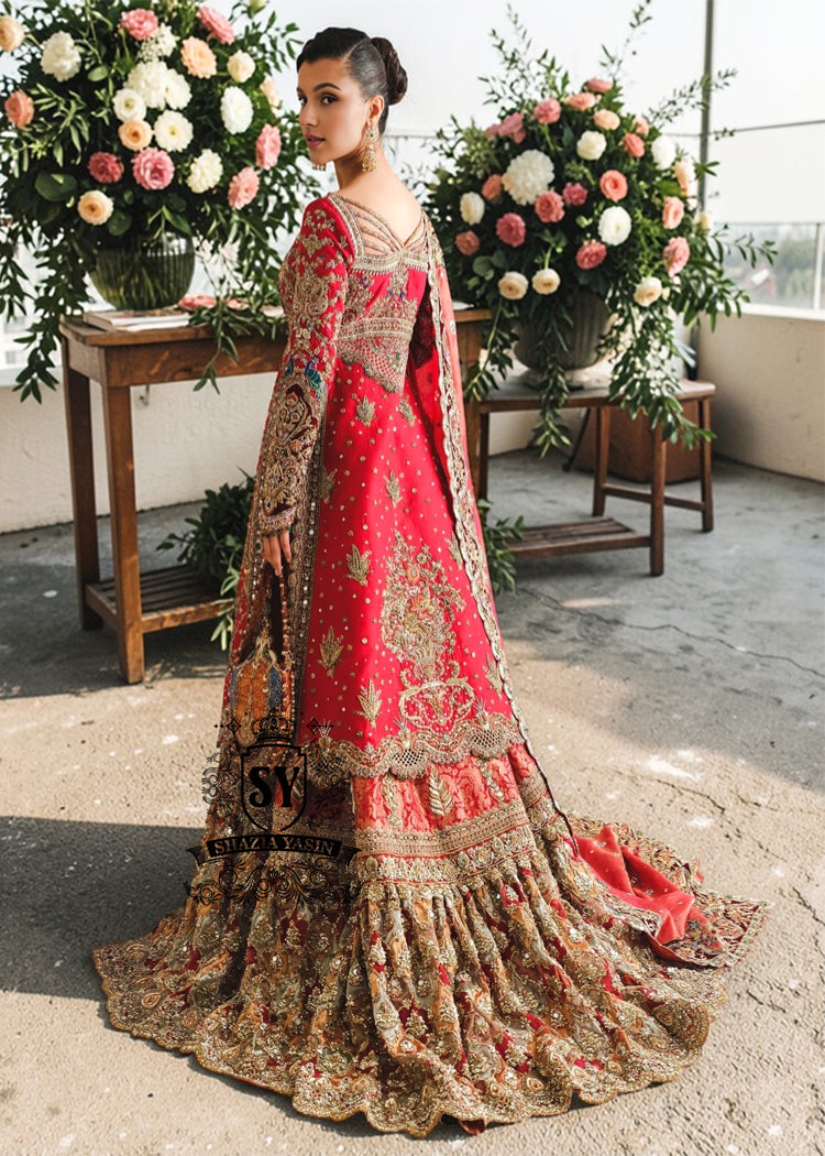 This exquisite red wedding dress exudes elegance and refinement, creating a sophisticated look perfect for a wedding. Chattapati Lehenga's designs are updated to reflect the latest trends, highlighting the bride's femininity.